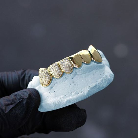 White deals gold grillz